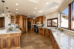 The kitchen offers high end appliances and everything you need to cook your favorite meals